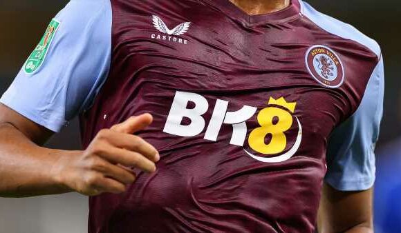 Aston Villa's stars forced to wear 'wet-look' kits for TV games