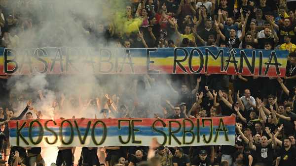 Kosovo's players WALK OFF the pitch against Romania after chants