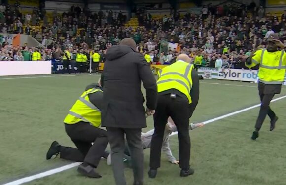 Rodgers rushes to push steward off young Celtic fan who got tackled to floor
