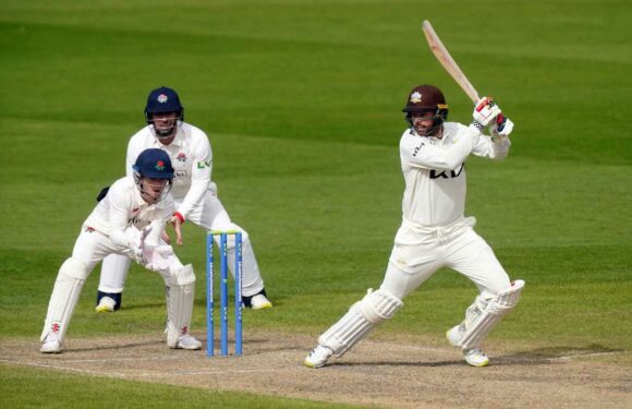 Surrey stay on course for another title with commanding win over Warwickshire