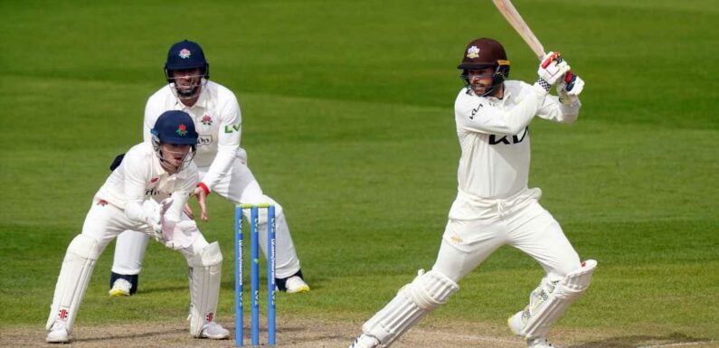 Surrey stay on course for another title with commanding win over Warwickshire