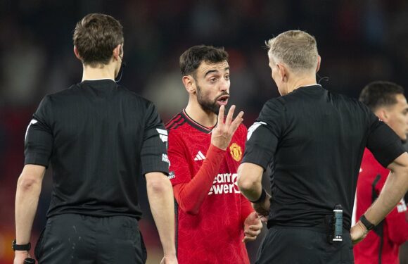 Football's lawmakers considering trials to reduce abuse of referees