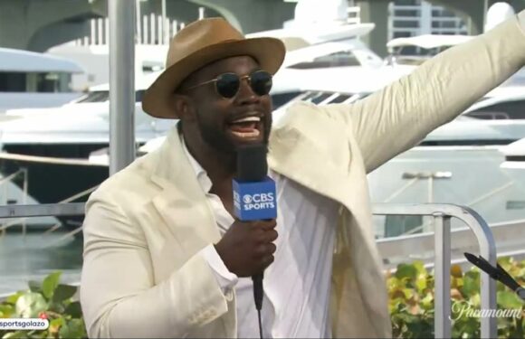 Richards turns heads with VERY bold white suit for CBS show in Miami