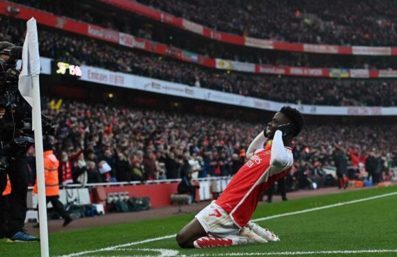 Bukayo Saka and Martin Odegaard fire Arsenal four points clear at the top of the Premier League