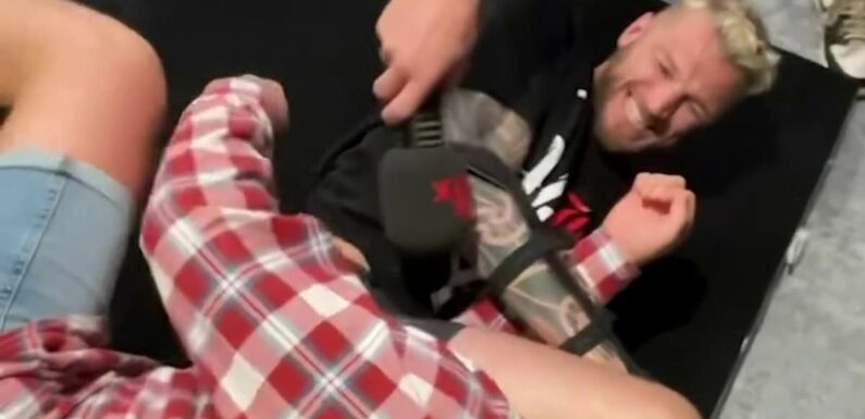 Watch the insane moment UFC star chokes a radio presenter unconscious